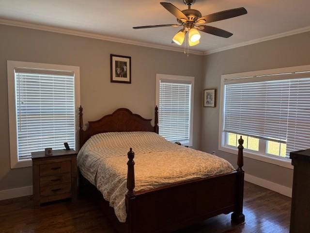 bedroom featuring a ceiling fan, dark wood finished floors, crown molding, and baseboards