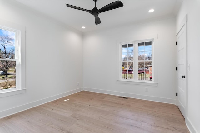 unfurnished room with recessed lighting, visible vents, baseboards, and light wood-style flooring