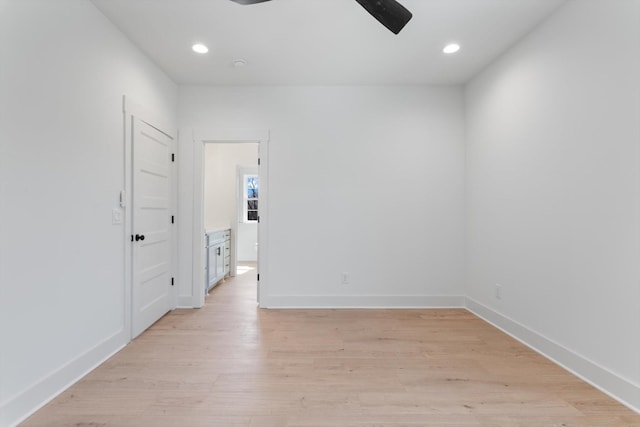 unfurnished room with recessed lighting, baseboards, light wood-style floors, and ceiling fan