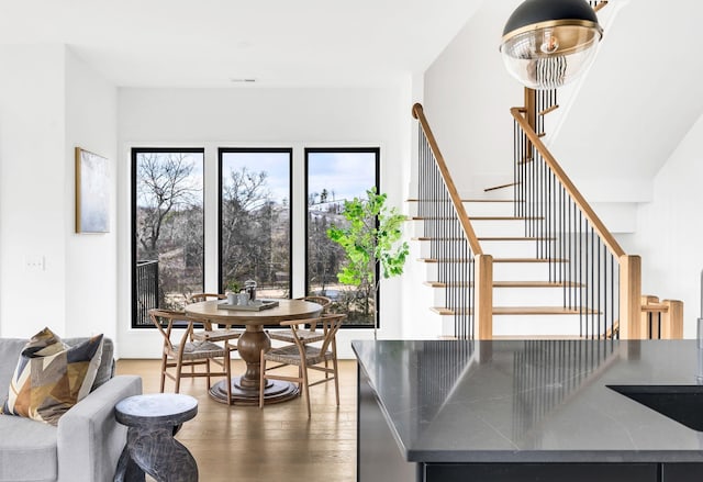 dining area with dark wood-type flooring