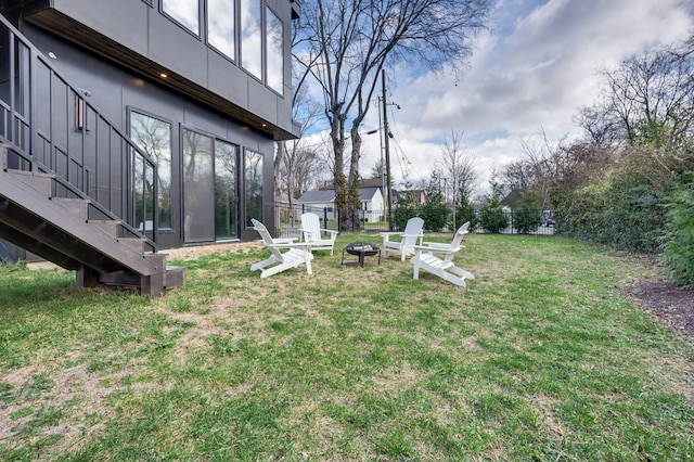 view of yard featuring a fire pit