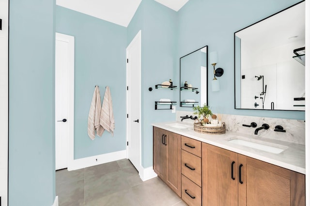 bathroom featuring tile patterned floors, vanity, and walk in shower