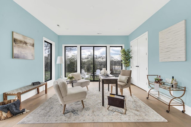 living room with light hardwood / wood-style floors