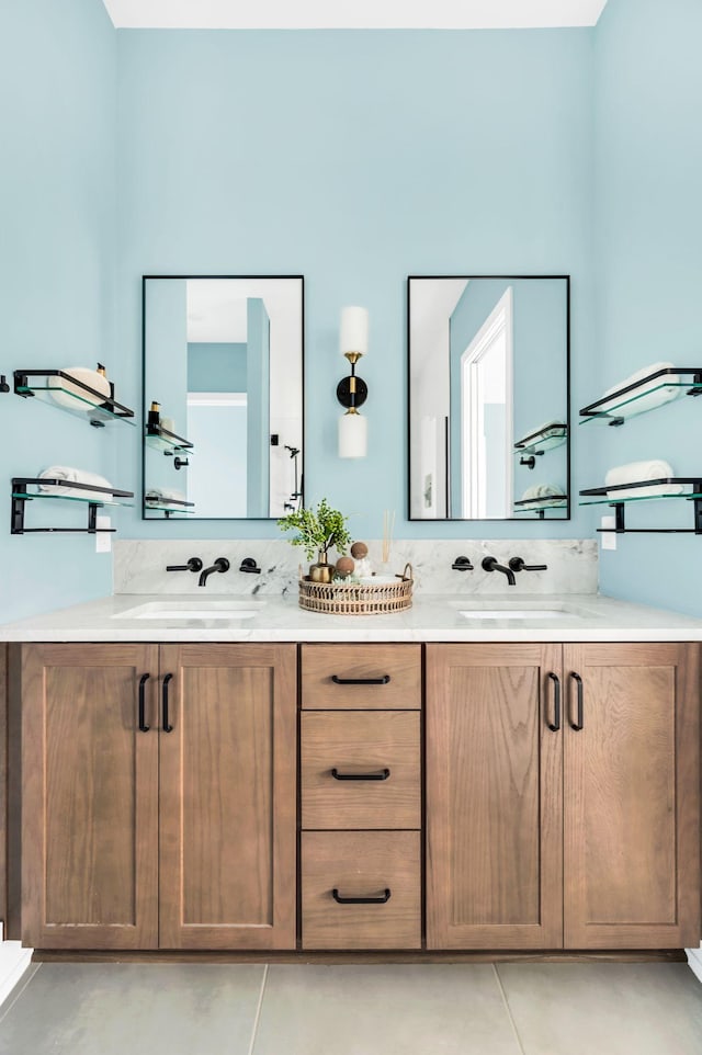 bathroom featuring tile patterned floors and vanity