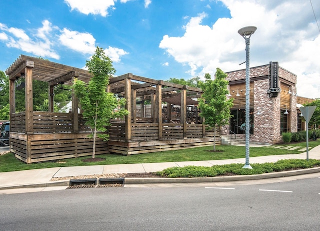 exterior space with a pergola