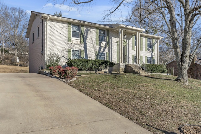 view of front of property with a front lawn