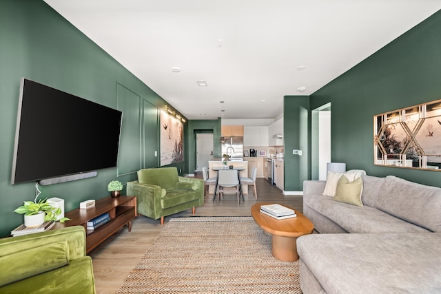 living room featuring light hardwood / wood-style flooring