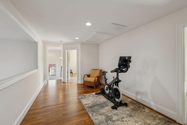 workout room featuring dark hardwood / wood-style flooring