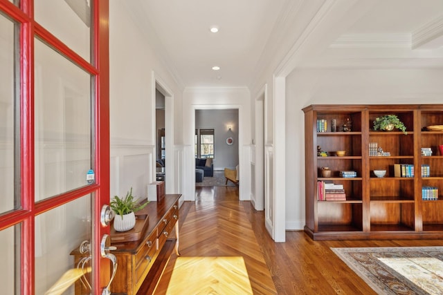 corridor featuring crown molding