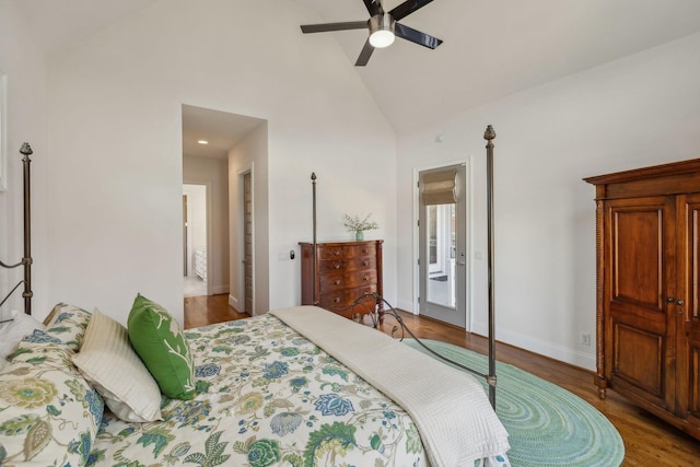 bedroom featuring hardwood / wood-style floors, high vaulted ceiling, ceiling fan, and access to exterior