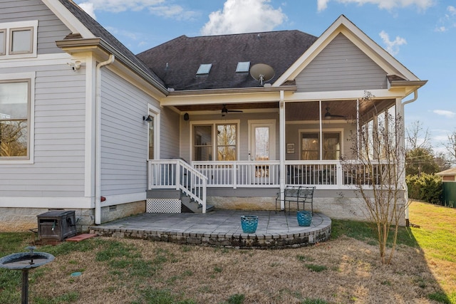 exterior space with a patio area, a front lawn, and a porch