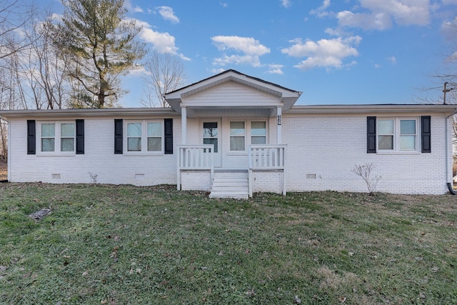 ranch-style home with crawl space, covered porch, a front lawn, and brick siding