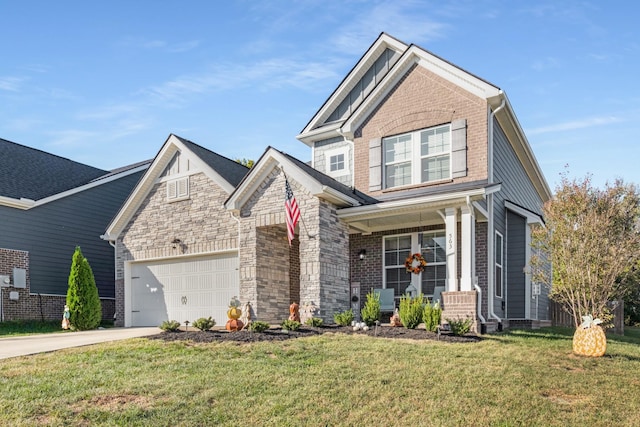 craftsman-style home with covered porch, a garage, and a front lawn