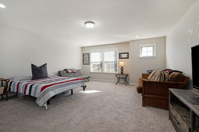 bedroom with light carpet