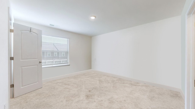 empty room with light carpet