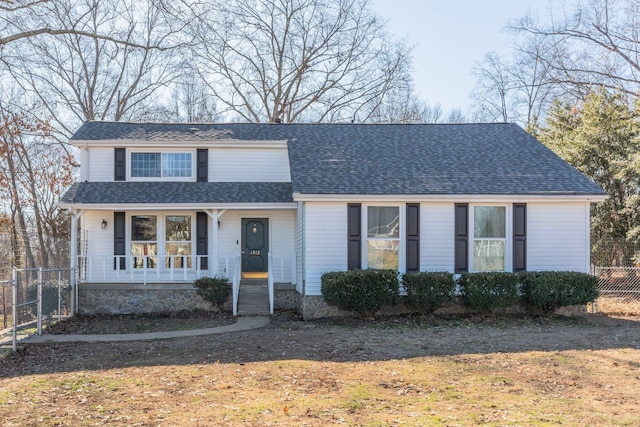 view of front of house featuring a front lawn and a porch