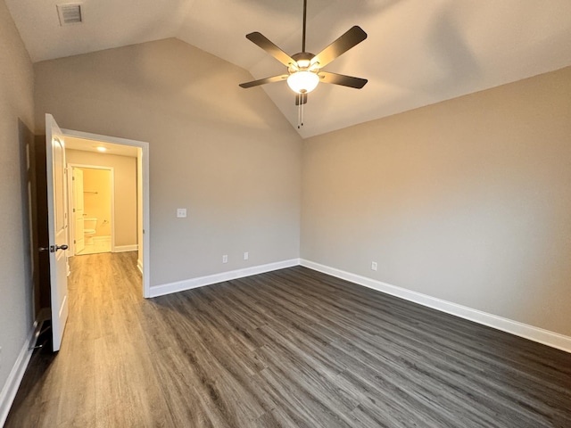 interior space featuring ceiling fan, dark hardwood / wood-style floors, and high vaulted ceiling