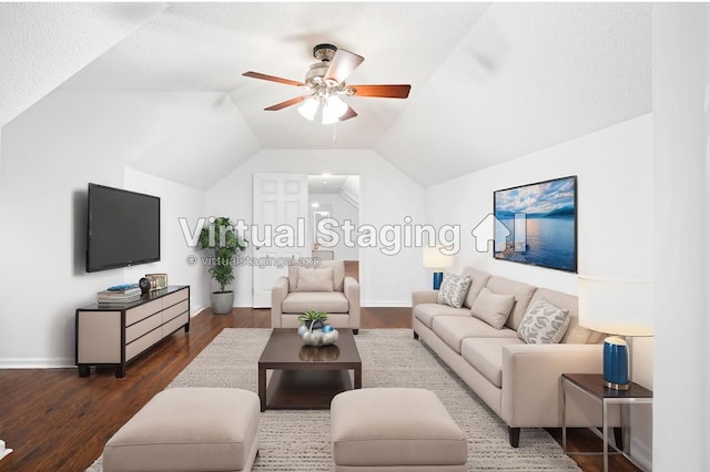 living area featuring lofted ceiling, a ceiling fan, and wood finished floors