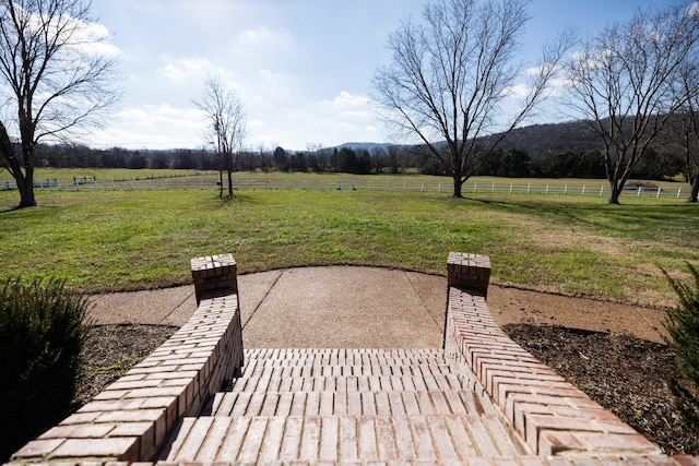 view of patio / terrace featuring a rural view