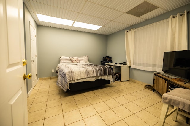 bedroom with light tile patterned flooring