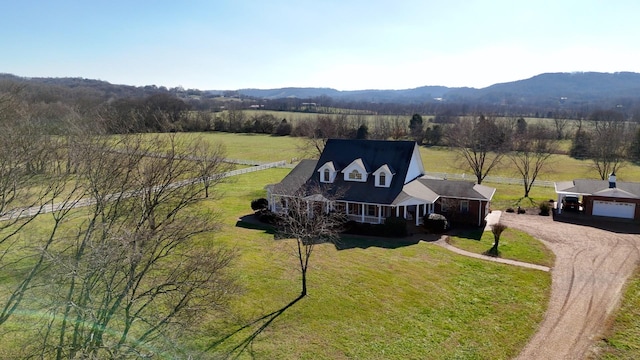 bird's eye view featuring a mountain view and a rural view