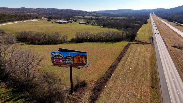 bird's eye view with a mountain view and a rural view