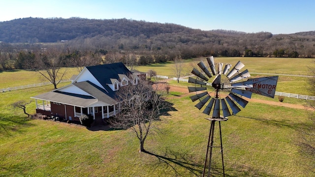 birds eye view of property featuring a rural view