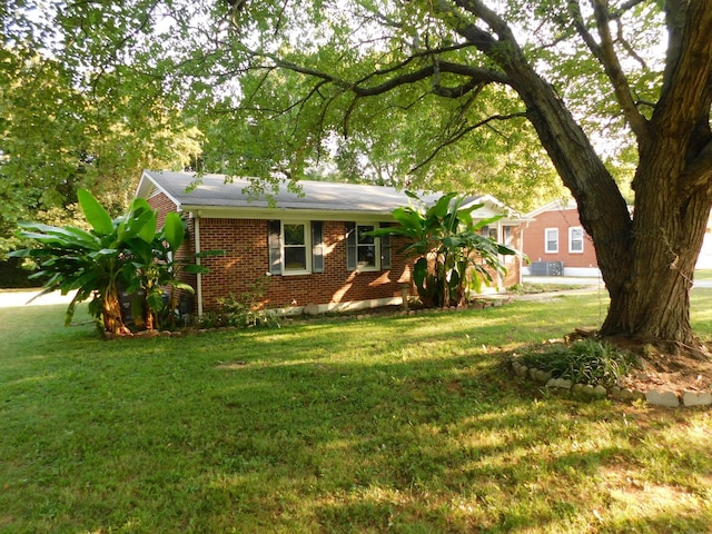 exterior space with a front yard