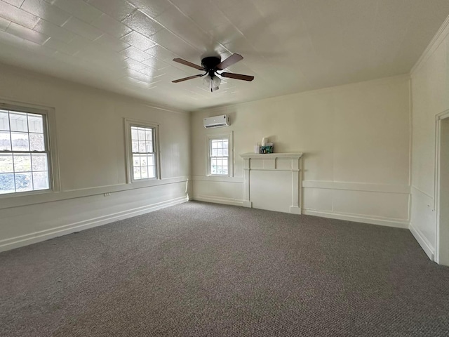 empty room with ceiling fan, dark carpet, and a wall mounted AC