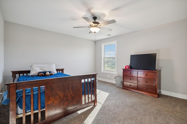 carpeted bedroom with ceiling fan