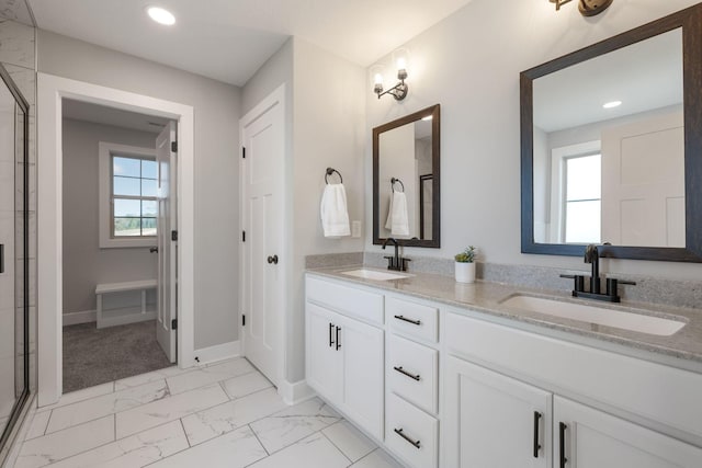 bathroom with vanity and walk in shower