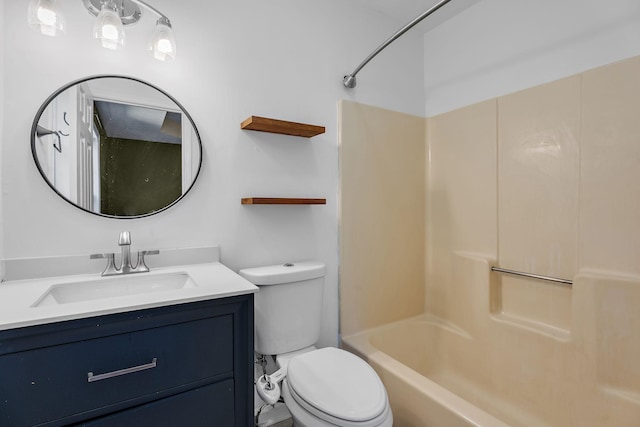 full bathroom with vanity, shower / bath combination, and toilet