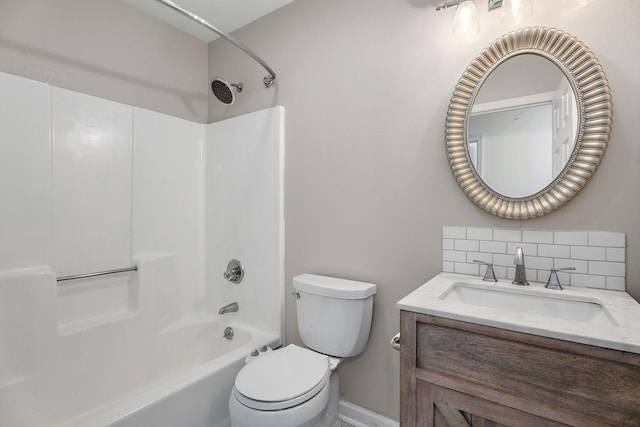 full bathroom with vanity, backsplash, toilet, and  shower combination