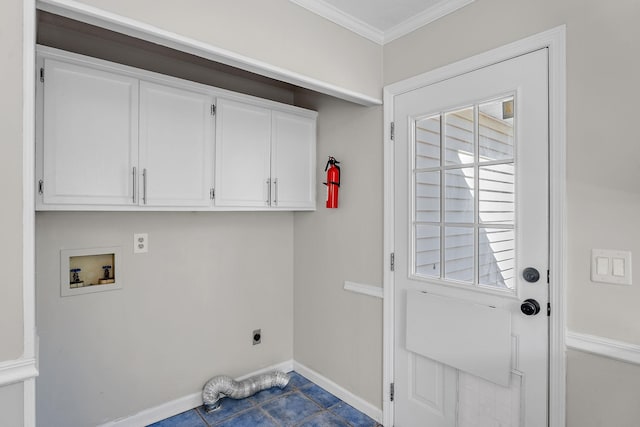 washroom with washer hookup, electric dryer hookup, cabinets, and a wealth of natural light