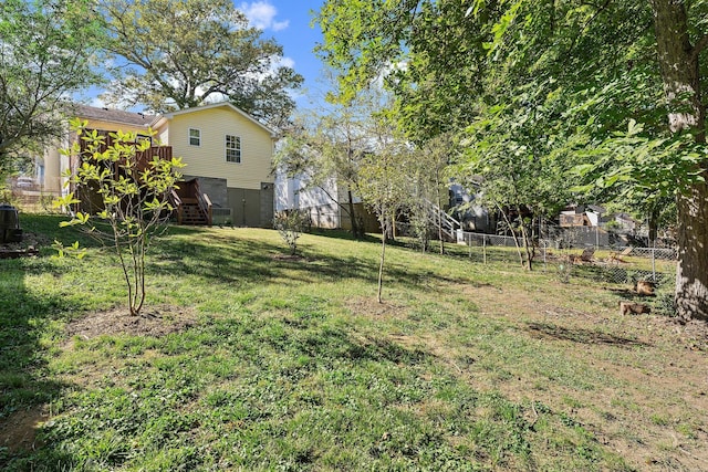 view of yard with a wooden deck