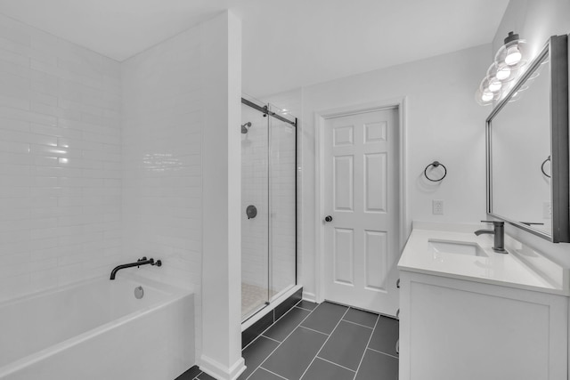 bathroom with tile patterned flooring, vanity, and plus walk in shower