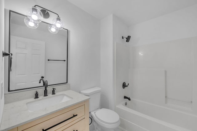 full bathroom with vanity, bathtub / shower combination, and toilet