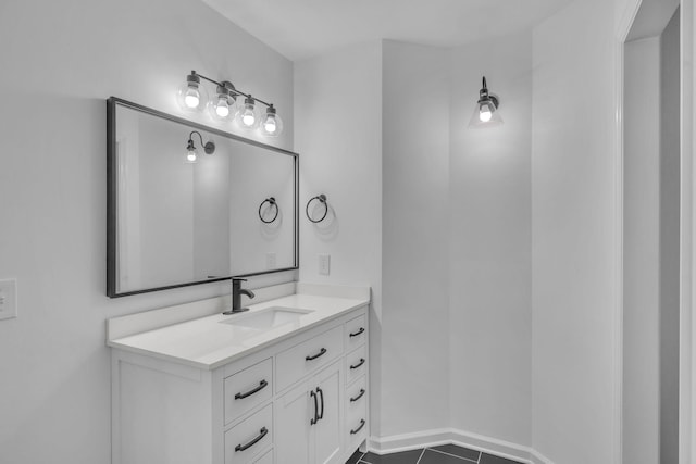 bathroom with tile patterned flooring and vanity