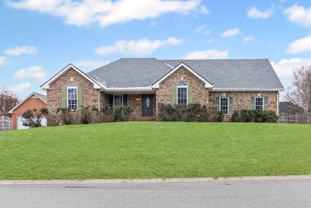 view of front of home with a front yard