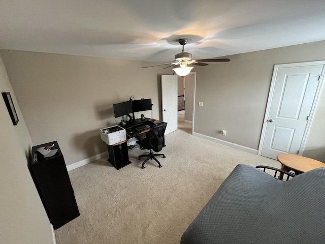 office with ceiling fan and light carpet