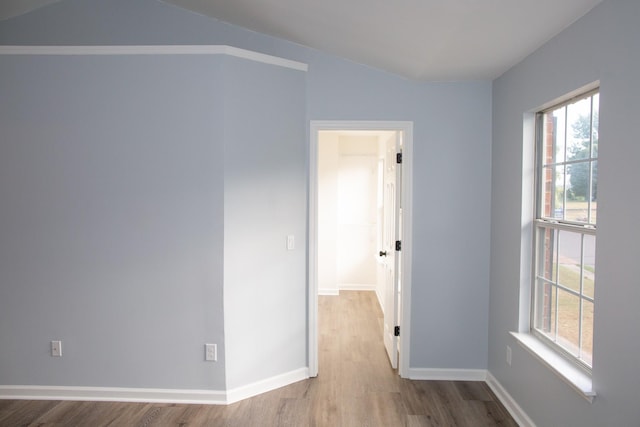 spare room with light hardwood / wood-style floors