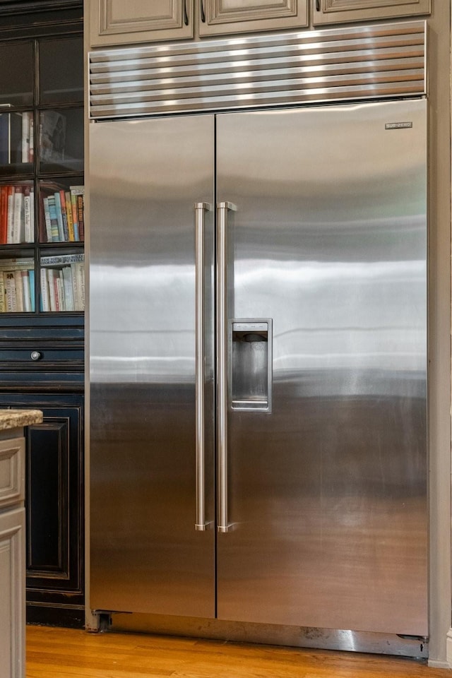 kitchen with stainless steel built in fridge