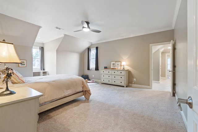 bedroom with crown molding, light carpet, and ceiling fan