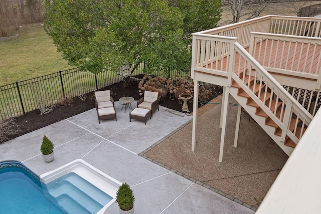 view of patio / terrace featuring a fenced in pool