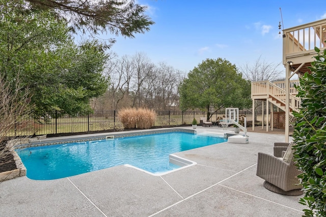 view of pool featuring a patio area