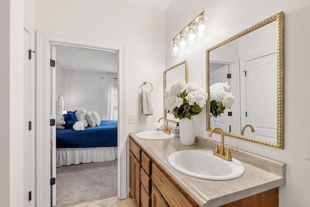 bathroom featuring tile patterned floors and vanity