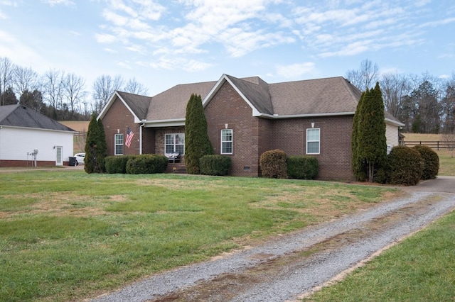 view of front of home with a front lawn