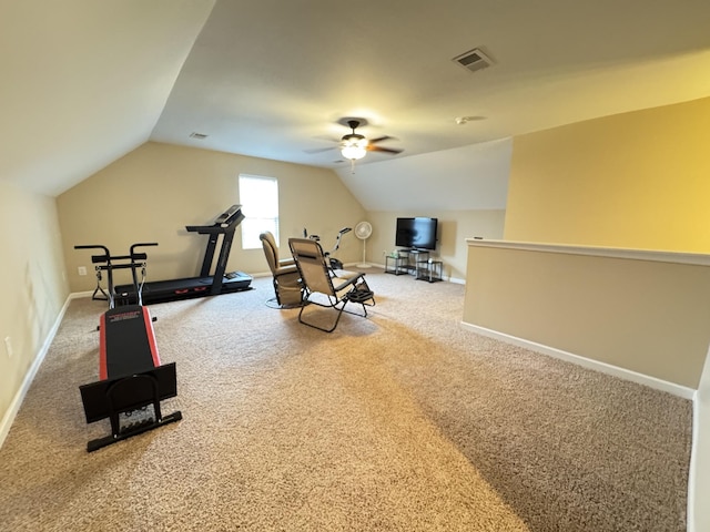 workout room featuring ceiling fan, carpet floors, and vaulted ceiling