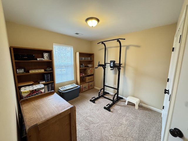 workout room with light carpet