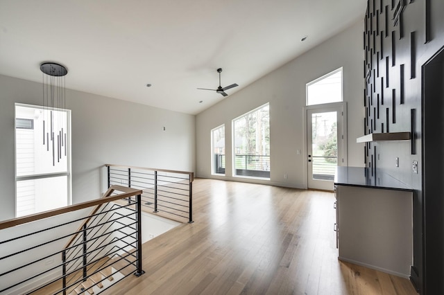 empty room featuring ceiling fan and light hardwood / wood-style floors